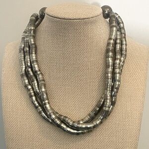 Twisty/bendy necklace.